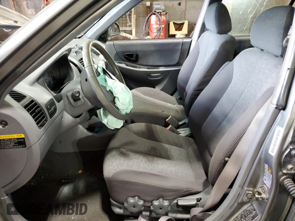2005 Hyundai Accent GLS with VIN KMHCG45C95U632932, listed as a Copart auction lot 69448004 with 0 mi miles and Salvage Title. Bid and sale history available at carsss.com. Image 7.