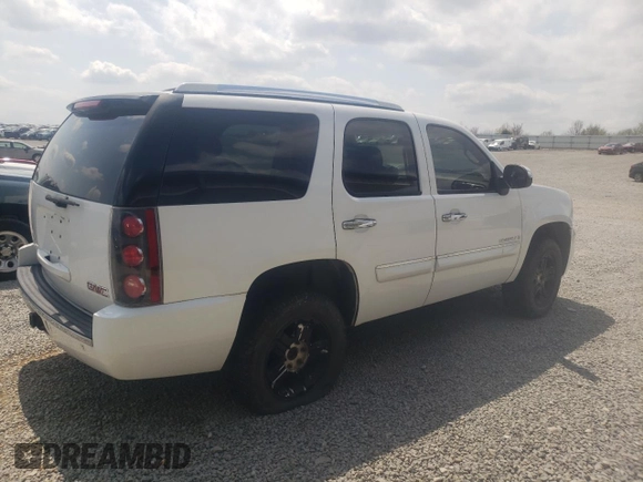 2007 GMC Yukon Denali z VIN 1GKFK63817J345216, wystawiony jako Copart lot #52853275 z przebiegiem 245 524 mil mil oraz Szkoda całkowita • Salvage title. Historia ofert i sprzedaży dostępna na DreamBid. Obrazek 3.