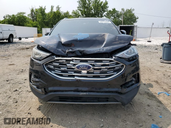 2020 Ford Edge Titanium z VIN 2FMPK4K97LBA56544, wystawiony jako Copart lot #59314005 z przebiegiem 84 861 mil mil oraz Czysty tytuł • Clean title. Historia ofert i sprzedaży dostępna na DreamBid. Obrazek 5.