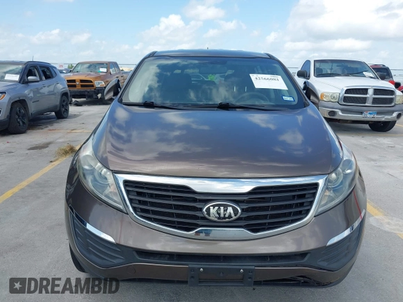2013 Kia Sportage LX with VIN KNDPB3A28D7375304, listed as a IAAI auction lot 42566081 with 17,890 mi miles and . Bid and sale history available at DreamBid. Image 6.