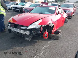 2014 Nissan 370Z Nismo with VIN JN1AZ4EH9EM636306, listed as a IAAI auction lot 41467766 with 101,021 mi miles and . Bid and sale history available at DreamBid. Image 19.