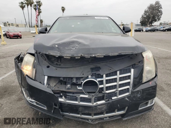 2013 Cadillac CTS Premium с VIN 1G6DP5E38D0107402, выставлен на аукционе Copart как лот 53307855 с пробегом 125 639 миль миль и Списание • Salvage title. История ставок и продаж доступна на DreamBid. Изображение 5.