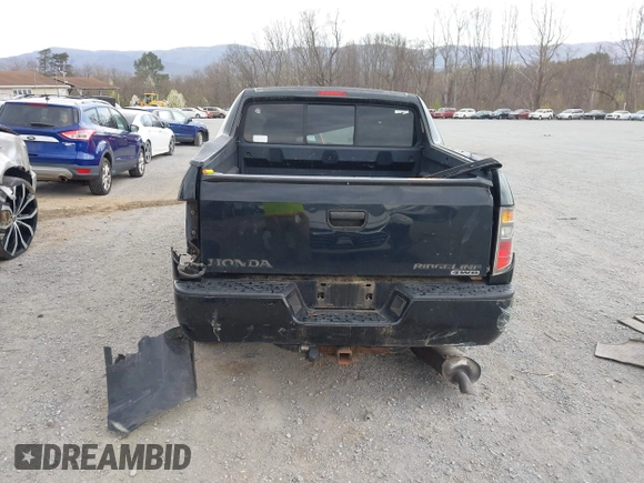 2006 Honda Ridgeline RT with VIN 2HJYK16266H558981, listed as a IAAI auction lot 41887331 with 252,112 mi miles. Bid and sale history available at carsss.com. Image 16.