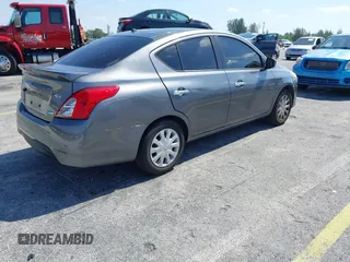 2016 Nissan Versa S Plus with VIN 3N1CN7AP6GL901666, listed as a IAAI auction lot 42126865 with 158,067 mi miles. Bid and sale history available at carsss.com. Image 4.