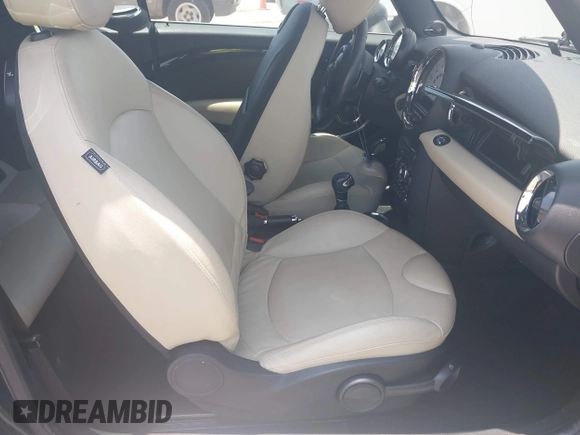 2013 MINI Convertible S with VIN WMWZP3C59DT550746, listed as a IAAI auction lot 39538986 with 59,934 mi miles and . Bid and sale history available at DreamBid. Image 5.