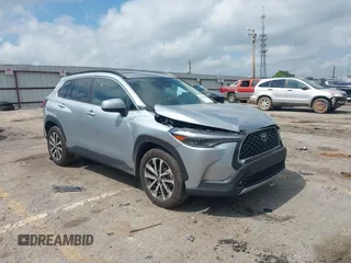 2023 Toyota Corolla Cross XLE with VIN 7MUDAAAG0PV057750, listed as a IAAI auction lot 42302284 with 31,404 mi miles and . Bid and sale history available at DreamBid. Image 1.