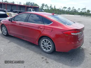 2020 Ford Fusion SE with VIN 3FA6P0HD5LR164755, listed as a IAAI auction lot 42092028 with 96,959 mi miles and . Bid and sale history available at DreamBid. Image 3.