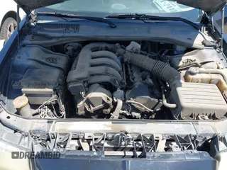 2005 Chrysler 300 with VIN 2C3JA43R65H668010, listed as a IAAI auction lot 41976405 with 216,099 mi miles. Bid and sale history available at carsss.com. Image 10.