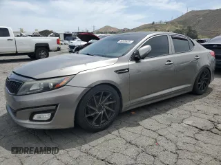 2015 Kia Optima LX z VIN 5XXGM4A77FG417547, wystawiony jako Copart lot #56635635 z przebiegiem 172 372 mil mil oraz Szkoda całkowita • Salvage title. Historia ofert i sprzedaży dostępna na DreamBid. Obrazek 1.