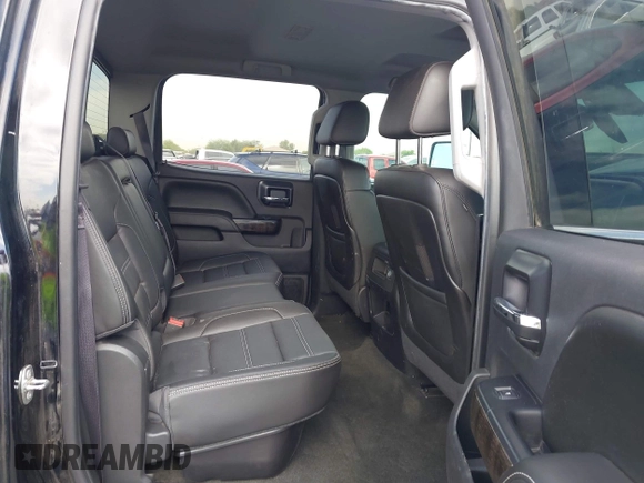 2015 GMC Sierra 2500HD Denali z VIN 1GT120E86FF667058, wystawiony jako IAAI lot #42212058 z przebiegiem 104 069 mil mil oraz . Historia ofert i sprzedaży dostępna na DreamBid. Obrazek 8.