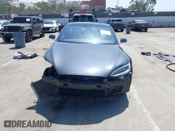 2016 Tesla Model S 90D with VIN 5YJSA1E22GF138236, listed as a IAAI auction lot 42532245 with 72,839 mi miles and . Bid and sale history available at DreamBid. Image 13.
