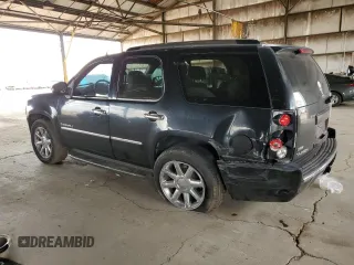 2009 GMC Yukon Denali z VIN 1GKFK03269R144974, wystawiony jako Copart lot #49354815 z przebiegiem 141 569 mil mil oraz Szkoda całkowita • Salvage title. Historia ofert i sprzedaży dostępna na DreamBid. Obrazek 2.