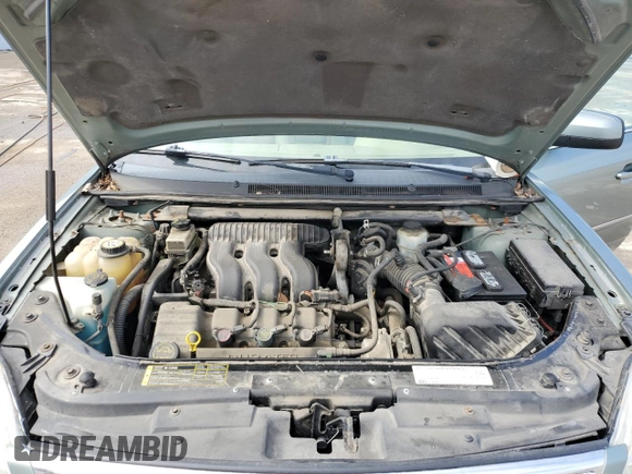 2006 Ford Five Hundred SEL с VIN 1FAFP24196G135181, выставлен на аукционе Copart как лот 57807965 с пробегом 168 929 миль миль и Списание • Salvage title. История ставок и продаж доступна на DreamBid. Изображение 11.