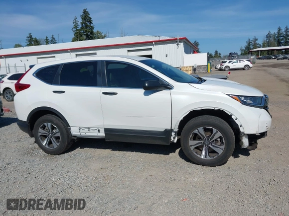 2019 Honda CR-V LX z VIN 5J6RW6H34KL001445, wystawiony jako IAAI lot #42369616 z przebiegiem 13 553 mil mil oraz . Historia ofert i sprzedaży dostępna na DreamBid. Obrazek 14.