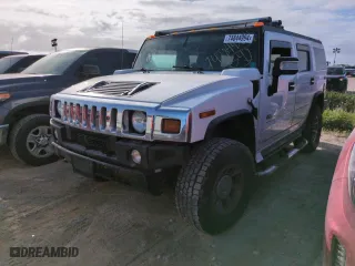 2006 Hummer H2 with VIN 5GRGN23U26H121003, listed as a Copart auction lot 74844994 with 0 mi miles and Salvage Title. Bid and sale history available at carsss.com. Image 1.