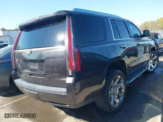 2015 Cadillac Escalade Luxury with VIN 1GYS3MKJ2FR518865, listed as a IAAI auction lot 41890235 with 156,849 mi miles. Bid and sale history available at carsss.com. Image 4.