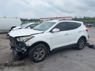 2014 Hyundai Santa Fe with VIN 5XYZU3LB9EG229255, listed as a IAAI auction lot 42407410 with 201,523 mi miles and . Bid and sale history available at DreamBid. Image 18.