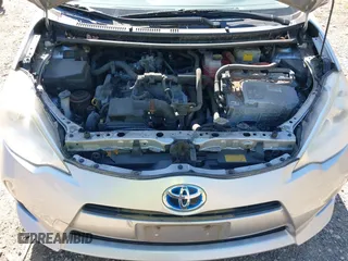2013 Toyota Prius One with VIN JTDKDTB30D1047034, listed as a IAAI auction lot 42143557 with 186,866 mi miles. Bid and sale history available at carsss.com. Image 10.