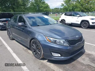 2015 Kia Optima LX with VIN KNAGM4A73F5613986, listed as a IAAI auction lot 40066154 with 209,498 mi miles and . Bid and sale history available at DreamBid. Image 1.