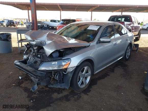 2014 Volkswagen Passat Wolfsburg Ed with VIN 1VWAT7A38EC051892, listed as a IAAI auction lot 41523058 with 122,493 mi miles. Bid and sale history available at carsss.com. Image 2.
