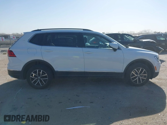 2021 Volkswagen Tiguan SE with VIN 3VV3B7AX9MM051920, listed as a IAAI auction lot 41826721 with 127,699 mi miles and . Bid and sale history available at DreamBid. Image 13.