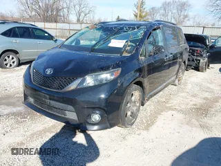 2014 Toyota Sienna SE with VIN 5TDXK3DC3ES521202, listed as a IAAI auction lot 41579320 with 182,982 mi miles and . Bid and sale history available at DreamBid. Image 2.