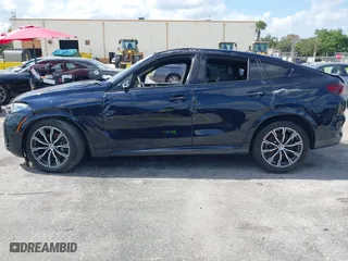 2024 BMW X6 xDrive40i with VIN 5UX33EX07R9V74903, listed as a IAAI auction lot 42063171 with 22,384 mi miles. Bid and sale history available at carsss.com. Image 14.