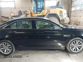 2015 Ford Taurus Limited with VIN 1FAHP2J87FG172580, listed as a IAAI auction lot 41891567 with 183,784 mi miles. Bid and sale history available at carsss.com. Image 13.