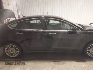 2016 Ford Fusion Titanium with VIN 3FA6P0K96GR197709, listed as a IAAI auction lot 40977902 with 135,259 mi miles. Bid and sale history available at carsss.com. Image 14.
