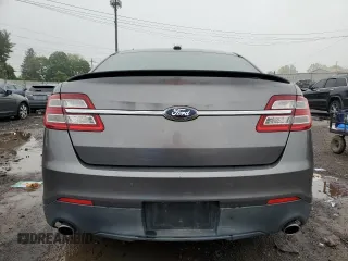 2013 Ford Taurus SEL z VIN 1FAHP2E87DG104349, wystawiony jako Copart lot #57143135 z przebiegiem 129 927 mil mil oraz Szkoda całkowita • Salvage title. Historia ofert i sprzedaży dostępna na DreamBid. Obrazek 6.