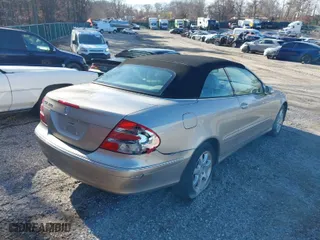 2004 Mercedes-Benz CLK-Class Cabriolet 3.2L with VIN WDBTK65GX4T012529, listed as a IAAI auction lot 41705903 with 66,947 mi miles. Bid and sale history available at carsss.com. Image 4.