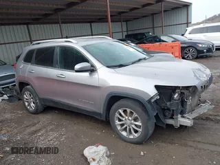 2019 Jeep Cherokee Latitude with VIN 1C4PJLCBXKD247676, listed as a IAAI auction lot 41598599 with 149,815 mi miles. Bid and sale history available at carsss.com. Image 14.