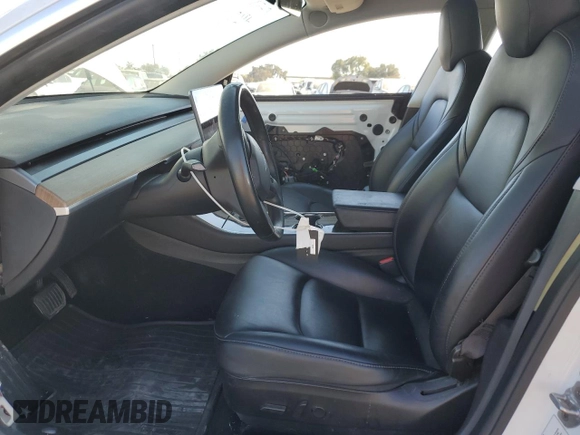 2019 Tesla Model 3 Mid Range with VIN 5YJ3E1EA4KF401500, listed as a Copart auction lot 80029064 with 100,077 mi miles and Salvage Title. Bid and sale history available at carsss.com. Image 7.