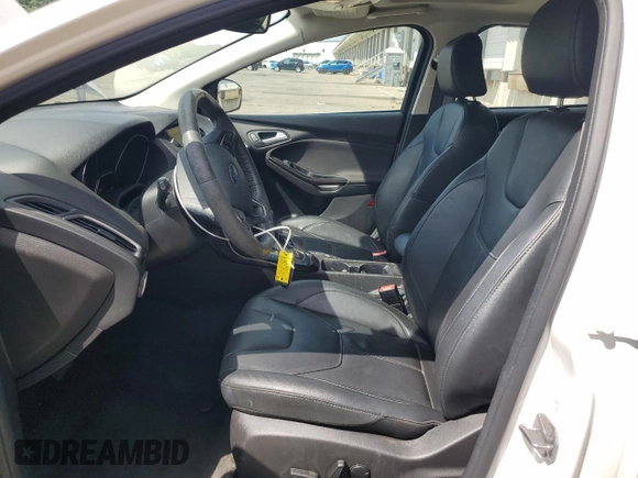 2017 Ford Focus Titanium with VIN 1FADP3N24HL206365, listed as a Copart auction lot 63199965 with 51,435 mi miles and Salvage title. Bid and sale history available at DreamBid. Image 7.