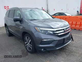 2016 Honda Pilot Touring with VIN 5FNYF6H91GB104449, listed as a IAAI auction lot 42483215 with 93,948 mi miles and . Bid and sale history available at DreamBid. Image 1.