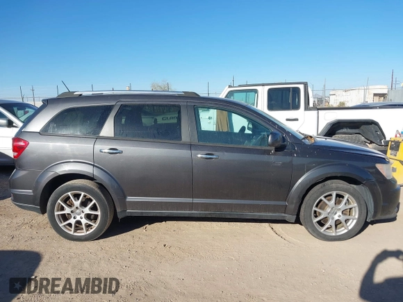 2014 Dodge Journey Limited with VIN 3C4PDDDG2ET175023, listed as a IAAI auction lot 41646669 with 112,663 mi miles and . Bid and sale history available at carsss.com. Image 13.