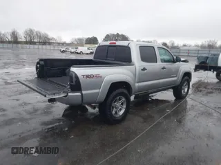 2014 Toyota Tacoma with VIN 3TMLU4EN2EM161239, listed as a IAAI auction lot 41536944 with 136,299 mi miles. Bid and sale history available at carsss.com. Image 4.
