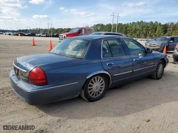 2011 Mercury Grand Marquis LS with VIN 2MEBM7FVXBX608636, listed as a Copart auction lot 82684944 with 157,843 mi miles and Salvage Title. Bid and sale history available at carsss.com. Image 3.