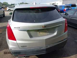 2017 Cadillac XT5 Luxury FWD z VIN 1GYKNBRS8HZ265955, wystawiony jako IAAI lot #42198769 z przebiegiem 125 086 mil mil oraz . Historia ofert i sprzedaży dostępna na DreamBid. Obrazek 16.