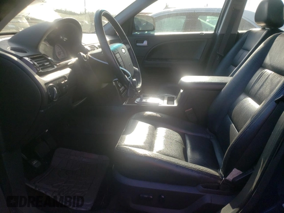 2005 Ford Five Hundred Limited with VIN 1FAFP251X5G152018, listed as a Copart auction lot 82747704 with 80,515 mi miles and Salvage Title. Bid and sale history available at carsss.com. Image 7.