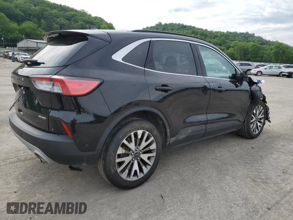 2021 Ford Escape Titanium with VIN 1FMCU9J97MUA57521, listed as a Copart auction lot 58714055 with 83,201 mi miles and Salvage title. Bid and sale history available at DreamBid. Image 3.