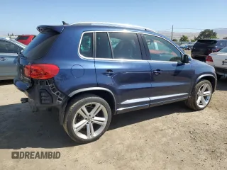 2015 Volkswagen Tiguan SE with VIN WVGAV7AX2FW094359, listed as a Copart auction lot 60101885 with 106,305 mi miles and Salvage title. Bid and sale history available at DreamBid. Image 3.