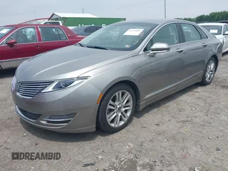 2016 Lincoln MKZ z VIN 3LN6L2G90GR621326, wystawiony jako IAAI lot #42375905 z przebiegiem 56 169 mil mil oraz . Historia ofert i sprzedaży dostępna na DreamBid. Obrazek 2.
