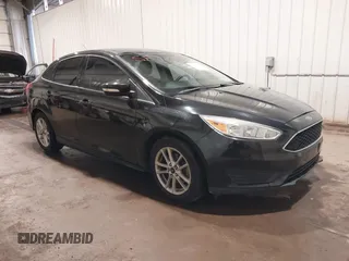 2015 Ford Focus SE with VIN 1FADP3F29FL203084, listed as a IAAI auction lot 42357973 with 99,002 mi miles and . Bid and sale history available at DreamBid. Image 1.