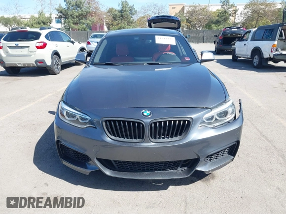 2014 BMW 2 Series M235i with VIN WBA1J7C51EVX33702, listed as a IAAI auction lot 41713337 with 83,076 mi miles. Bid and sale history available at carsss.com. Image 13.