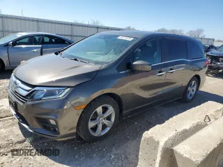 2018 Honda Odyssey EX-L with VIN 5FNRL6H78JB069850, listed as a Copart auction lot 49771875 with 103,914 mi miles and Salvage Title. Bid and sale history available at DreamBid. Image 1.