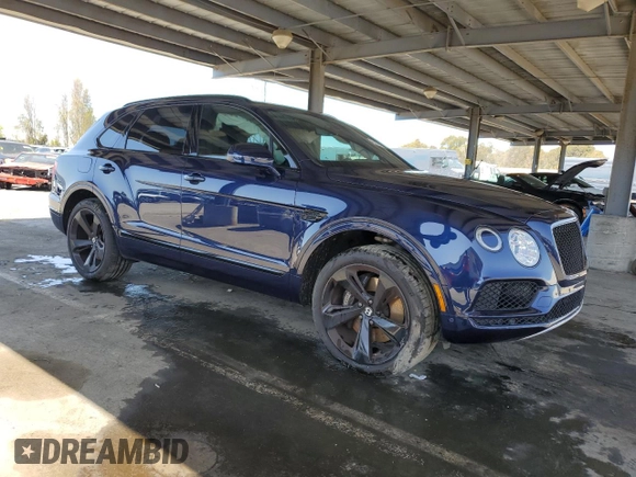 2019 Bentley Bentayga V8 z VIN SJAAM2ZV3KC027084, wystawiony jako Copart lot #45814705 z przebiegiem 38 490 mil mil oraz Szkoda całkowita • Salvage title. Historia ofert i sprzedaży dostępna na DreamBid. Obrazek 4.
