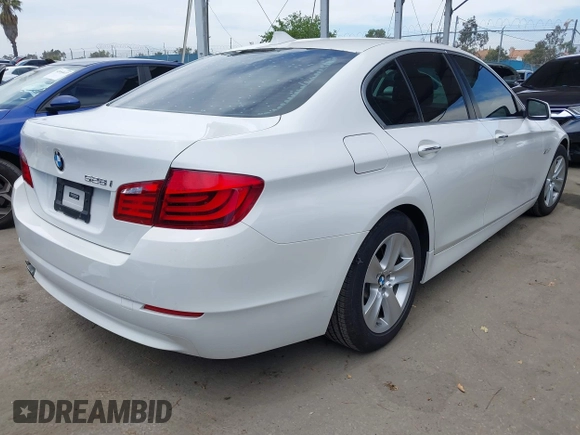 2013 BMW 5 Series 528i with VIN WBAXG5C50DDY34618, listed as a IAAI auction lot 42018050 with 85,272 mi miles and . Bid and sale history available at carsss.com. Image 4.