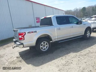 2018 Ford F-150 XL with VIN 1FTEW1EG2JFE36699, listed as a IAAI auction lot 41842524 with 152,813 mi miles. Bid and sale history available at carsss.com. Image 4.
