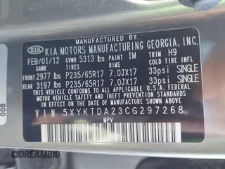 2012 Kia Sorento LX with VIN 5XYKTDA23CG297268, listed as a IAAI auction lot 41427273 with 195,578 mi miles. Bid and sale history available at carsss.com. Image 9.